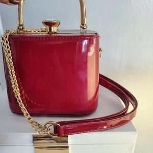 Elegant Red Box Clutch with Gold Accents